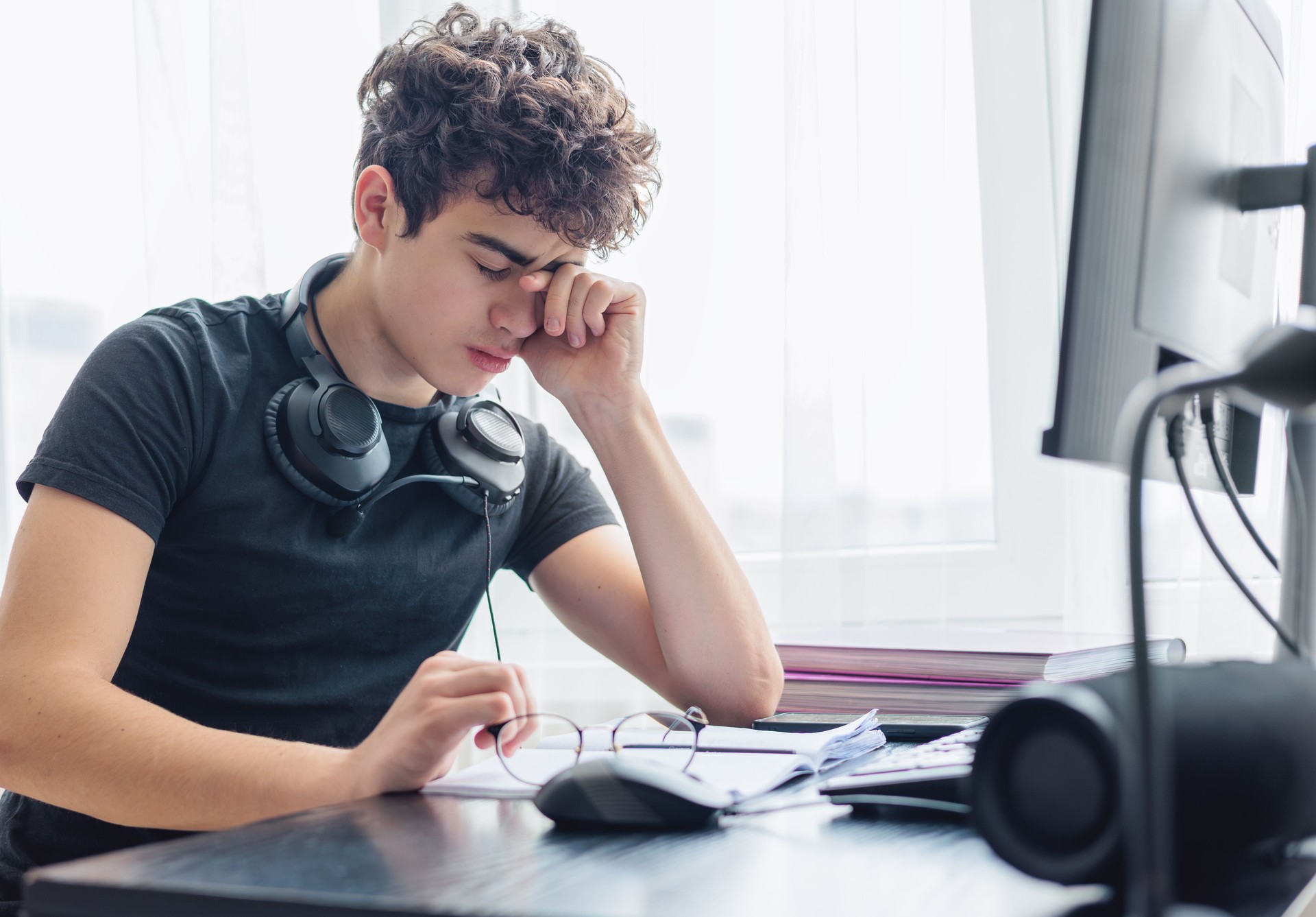 Stressed Out Student. Study Burnout. Overwhelmed. Anxiety. Mental Fatigue. onlinelearning. Overwhelmed Teenager Struggling with Studying and Exam Stress. Learning Difficulties, ADHD, Autism. cyberbullying. Copyspace